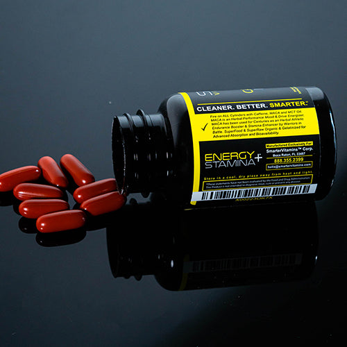 Smarter Caffeine Maca bottle laying on table with supplements spilled out.