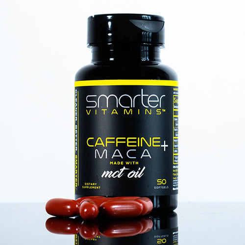 Smarter Caffeine Maca made with MCT Oil on a table with supplements. 