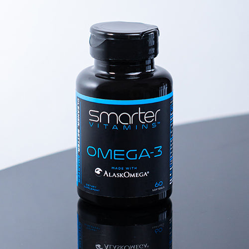 Bottle of Smarter Omega-3 on a reflective table Randy Jabero