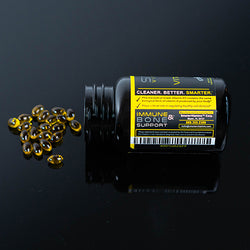 Smarter Vitamin D3 sideways on a table with poured out supplements